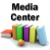 stack of books with an apple in front and the words Media Center above