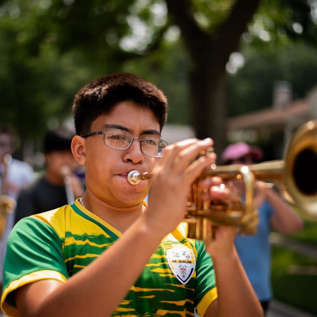 Marching Bands Break Camp with Neighborhood Parades
