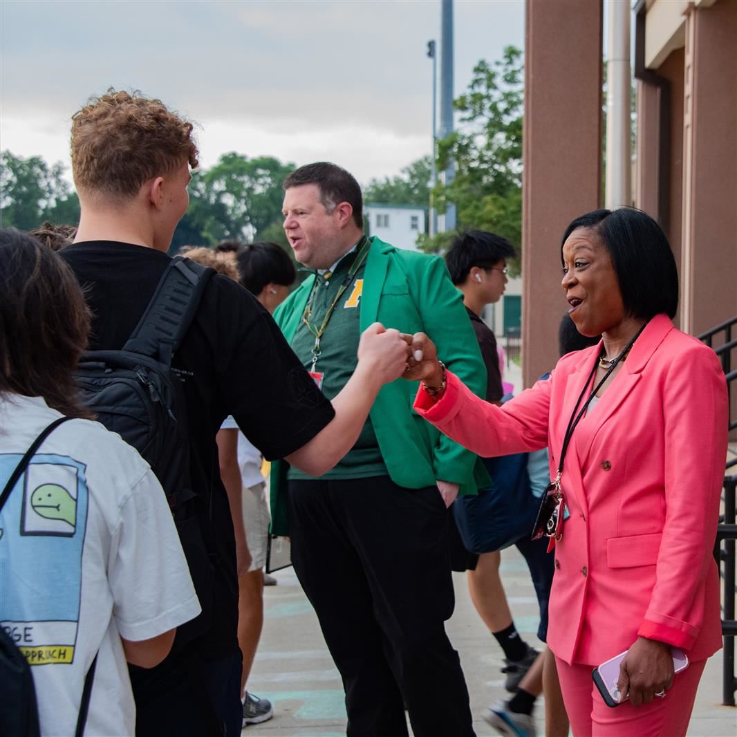 Dr. Judith Campbell meets students outside of Fremd High School