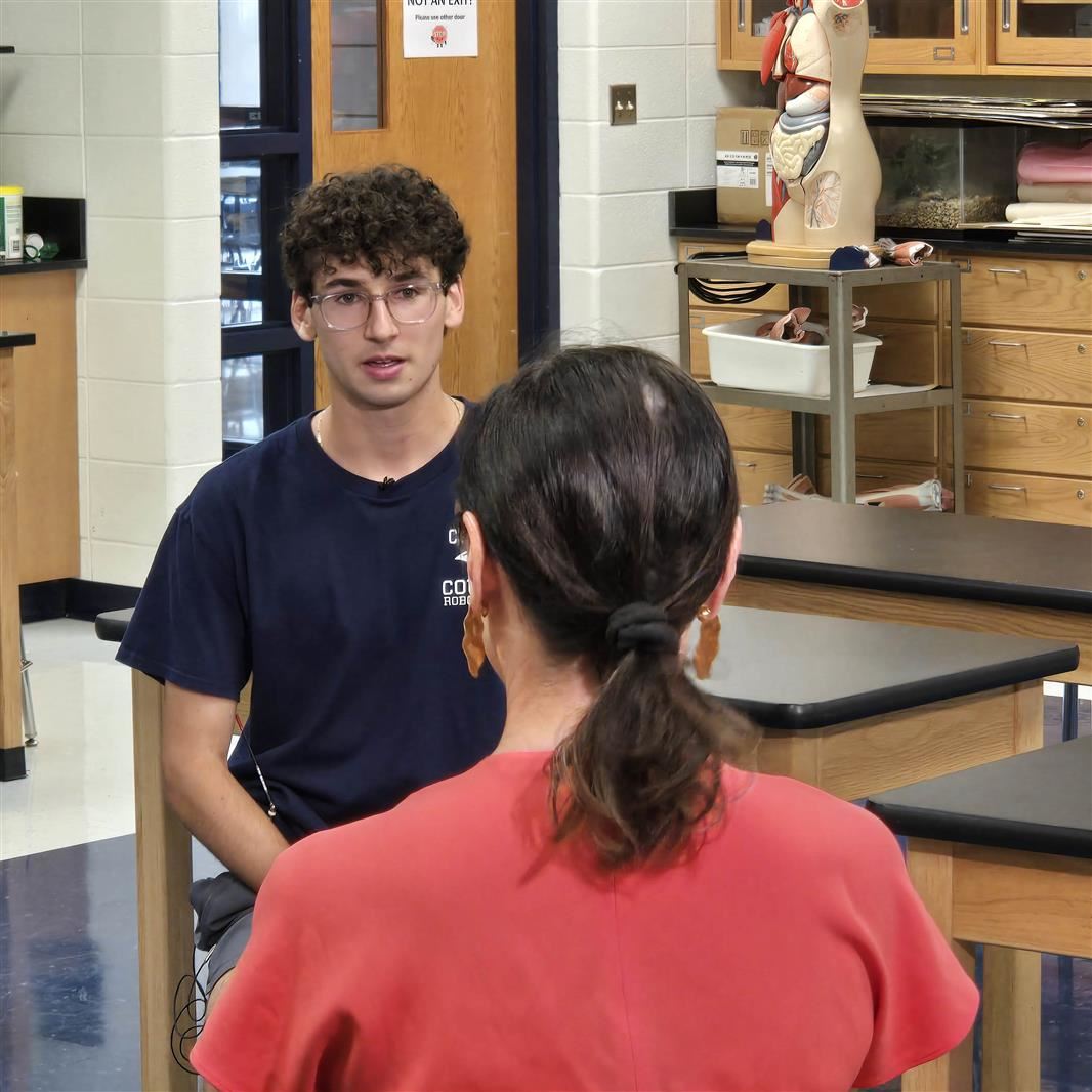  Conant senior Joseph Basile speaks with NBC reporter Natalie Martinex