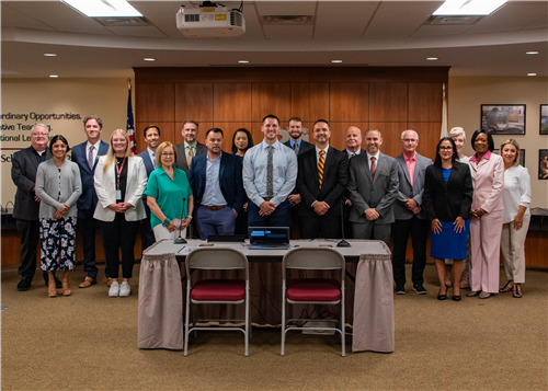 New District admins with the Board of Education