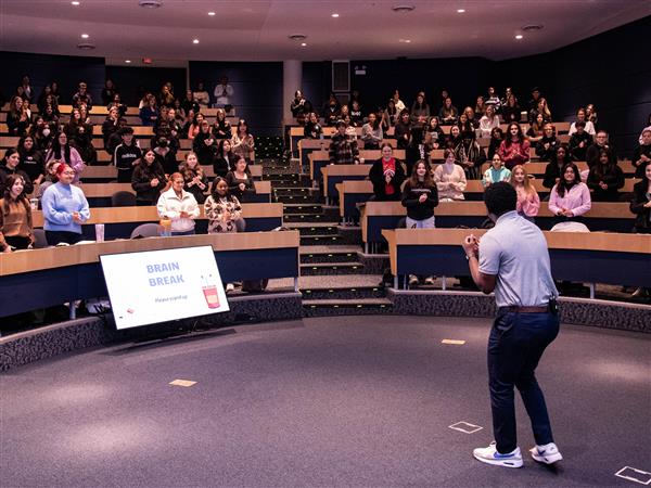 Mr Reed addressing students from District 211, District 220, and District 214 at the Future Educators of America conference at Harper College.